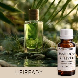 Parfüm, auf einem Felsen platziert, mit einem Blatt daneben.