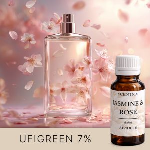 Jasminblüten und ein Parfümflakon in den Sonnenstrahlen.