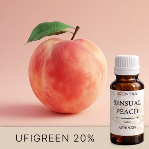 Saftiger Pfirsich mit einem Blatt auf rosa Hintergrund.